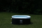 Zennest Pro Oval 140 filled with water in a real garden